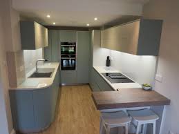 In addition, the rustic kitchen cabinet style also heavily make use of rough textures through mixing wooden cabinetry with natural stone backsplashes, antique metal hardware, etc. Arcos Eolis Green Tea Vison Contemporary Kitchen Essex By Schmidt Kitchens Loughton Houzz