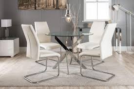 Peake glass and chrome dining table (black gloss base) with 6 leon grey leather chairs. Furniturebox Uk Novara Chrome Metal Round Glass Dining Table And 4 Black White Lorenzo Dining Chairs 4 White Chairs Buy Online In Guam At Desertcart Productid 57876833