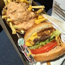 Two 100% pure beef patties, hand lettuce, tomato, spread, two slices of american cheese, with or without onions, stacked high on a freshly baked bun. Pin On Oc Life Things To Do