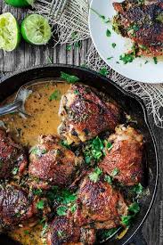 Our fall off the bone chicken is a great choice for weekend family dinner or when your friends come over. Cilantro Lime Chicken Thighs Recipe The Mediterranean Dish Chicken Recipes Recipes Chicken Thigh Recipes