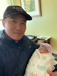 Please meet my daughter Taylor Han. Future black belt. She was born today  6lbs 6oz. Mom and the baby are both fine.