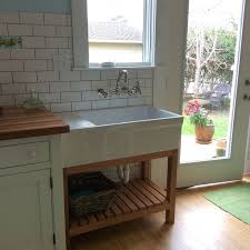 Talk About Creative This Sink Is Reminiscent To A Belfast Sink It Features A Whitehau Farmhouse Sink Kitchen Free Standing Kitchen Sink Farmhouse Sink Faucet