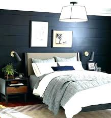 This farmhouse master bedroom has both modern and vintage touches. Grey Navy Blue Bedroom House N Decor