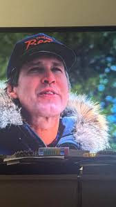 Why does Clark start to lisp when they are out to cut down a tree in the  beginning of the film?