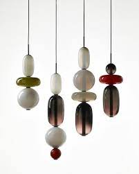 Bomma On Instagram Bomma S New Collections At Euroluce Take A Step Beyond Your Expectations Of Contem Contemporary Glass Design Pebble Pendant Pendant Lamp