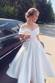 They reveal the top of the torso and neck, but also provide more support than, say, a strapless dress, ensuring the bride's bodice stays in place. White Off Shoulder Satin Tea Length Prom Dress White Evening Dress Dresstby