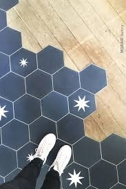 Beautiful Floor Transition Between Blue Hexagon Tiles And Wooden Floor Blue Plain And Star Patterned Cement T Hexagon Tiles Blue Tile Floor Hexagon Tile Floor