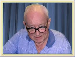 William Burger directing Academy band at Erie stadium