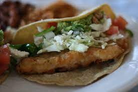 This fish tacos recipe has been perfected by my family and is a summertime favorite. Fresh Socal Style Fish Tacos Recipe With White Sauce