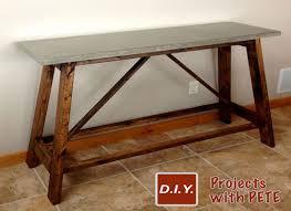 You can make this table by getting slabs of cypress wood with well placed holes, filling them with the powder, and sealing the top surface with resin. How To Build A Diy Concrete Table For Beginners Diy Pete