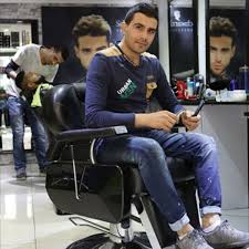 This barber is slick, stylin' and Syrian