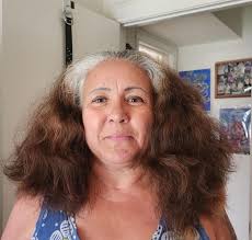 I'm looking for a recommendation for a hair salon for a middle aged woman  with naturally greying hair (I like the grey!). I'm specifically looking  for a salon where the hairdresser is