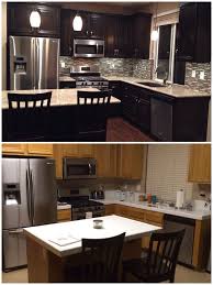 black kitchen cabinets with light