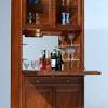 This cabinet is perfect for displaying all your fine stemware and glassware behind beveled glass doors. 1