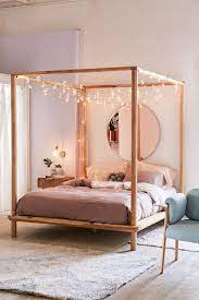 On more expensive beds, they may also be elaborately ornamental. Eva Wooden Canopy Bed Cozy Bedroom Lighting Wooden Canopy Bed Bedroom Inspirations