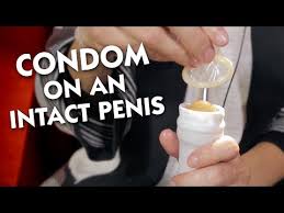 To put a condom on your uncircumcised penis, first make sure it is erect so the condom doesn't slip while you're putting it on. Nerdfighteria Wiki How To Put A Condom On An Intact Penis