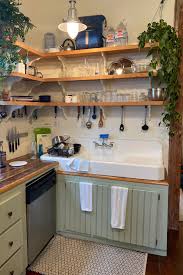 Vintage cast iron enameled sink and metal cabinets. Vintage Farmhouse Cast Iron Sink Is Around 100 Years Old And Still Looks Great Just Got Refinished Last Week Buyitforlife