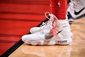 Pj tucker is driving around milwaukee with a ski mask on in a convertible ferrari during a snow storm. Pj Tucker Shoe Promotions