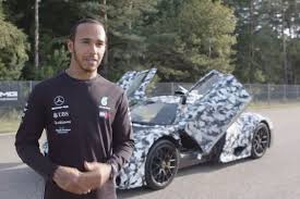 Lewis Hamilton Meets The Mercedes Amg Project One Mercedes Amg New Mercedes Amg Celebrity Cars
