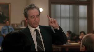 A really funny part of “My Cousin Vinny” I've never noticed before. While  the lawyer played by Austin Pendleton is giving his opening statement, Joe  Pesci, Ralph Macchio & Stan Rothenstein are