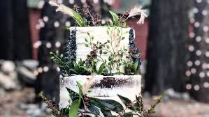 Rustic vertical swoop sunflower wedding cake. 20 Enchanting Rustic Wedding Cakes Cafemom Com