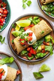 But if you like it covered in sauce and toppings, you may want to use a fork. Cheesy Green Chile Chicken Chimichangas Two Peas Their Pod