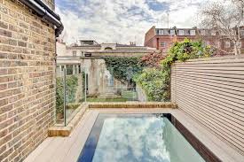 Skylights can be an integrated part of the design of a house, allowing the interior to feel as though it's connected with the exterior. London Terrace House Gets Smart Extension With Walk On Skylights