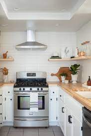 Vertical pieces on the sides called stiles, horizontal pieces on the top and bottom called rails, and a recessed panel in the middle. Make A Small Kitchen Look Larger With These Clever Design Tricks Better Homes Gardens
