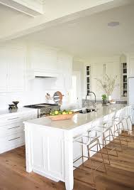 White kitchen cabinets have been trending for several years now, and don't seem to be going anywhere any time soon. Nantucket Inspired White Kitchen Design The Cabinets Are Painted In Benjamin Moore White Dove Oc 17 White Kitchen Design White Kitchen Paint Kitchen Design