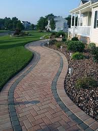 Here red bricks were laid in a running bond pattern with two sweeping curves. Top 50 Best Brick Walkway Ideas Hardscape Path Designs