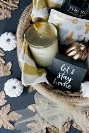 Show up with a gift basket filled with yummy eats. How To Put Together A Simple Housewarming Gift Basket This Is Our Bliss