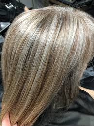 Women start going gray at different stages of their lives. Aging Beautifully Taking Blah To Dimensional Strawberry Blonde With Gray Highlights Grey Blonde Hair Gray Hair Growing Out Blonde Hair Going Grey