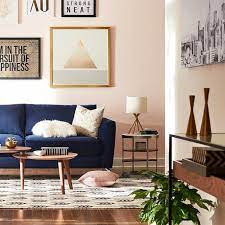 A color scheme can make or break how a room feels to a person. Blush Wall Color With A Navy Blue Couch Giving The Look A Perfect Calm Modern Living Room Style Blue Sofas Living Room Blue Couch Living Room Blue Couch Living