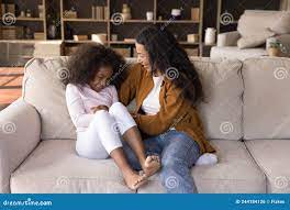 Joyful Happy African Mom Tickling Excited Daughter Girl on Couch Stock  Photo - Image of mother, family: 244184126