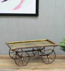 Brass fixtures and finishes are back in style, but they are not the flashy shiny finishes of the 1980s. Buy Copper Color Antique Brass Stand Metal Table Decor By Ananya Art Online Transport Showpieces Home Decor Pepperfry Product