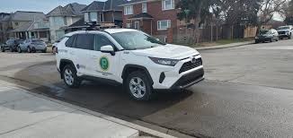 Street sweeping bans and the parking fines