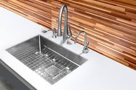 Easily released and secured, the nozzle comes with supporting armbar, a tight coil hose and complementary dual handle. Pulldown Kitchen Faucet Franke Kitchen Systems