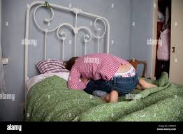 Sad anonymous girl bed hi-res stock photography and images - Alamy