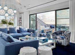 Beautiful Blue Living Room Decor With Blue Floral Armchairs And Blue Sectional Sofa Blue Living Room Decor Beach House Living Room Costal Living Room
