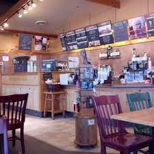 Opened in 1986 in what was formerly a red owl store (located at the intersection of white bear avenue and highway 61 on the western shore of the lake), it's one of the very few places you can actually sit with a cup of coffee and watch the sun rise that isn't a private home. Caribou Coffee Coffee Tea 23520 Hwy 7 Excelsior Mn Phone Number