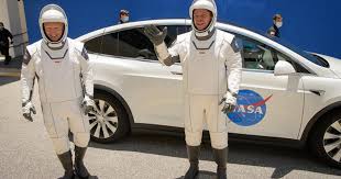 He plans to share more spacesuit photos in the days to come. Crew Dragon Astronauts Don Pressure Suits Run Through Practice Countdown Cbs News