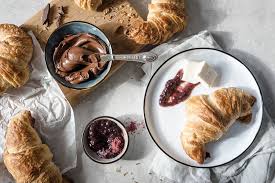 Fold the dough into three , bringing up the bottom unbuttered part of the dough, and then folding the top buttered part of the dough over. Bio Recipe By Stina Spiegelberg French Croissants Rapunzel Naturkost