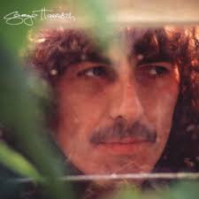 When did George Harrison release “Love Comes to Everyone”?