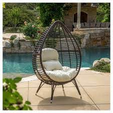cutter teardrop wicker patio lounge chair with cushion brown christopher knight home wicker lounge chair lounge chair outdoor patio lounge chairs