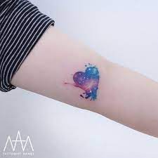 40 Colored Delicate Tattoos By Tattooist Nanci Tattooadore Delicate Tattoo Galaxy Tattoo Tattoos