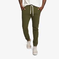 Our New Travel Pant Combines The Sporty Functionality Of A Track Pant And The Polished Versatility Of A Chino Wear Them On Or Travel Pants Pants Mens Travel