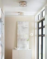 The iconic industrial design reminds us of the fixtures you see under the eaves of vintage barns. Installation Gallery Entry Foyer Lighting Ceiling Lighting