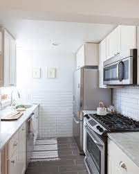 20 Stunning Examples That Show How To Make A Galley Kitchen Work Galley Kitchen Layout Small Condo Kitchen Galley Kitchens