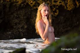 Blonde with tan lines nude in the sea at Brdteengal