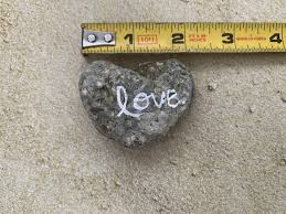Hand Written Love On Unique Heart Shaped Beach Stone Sea 2 Land Designs